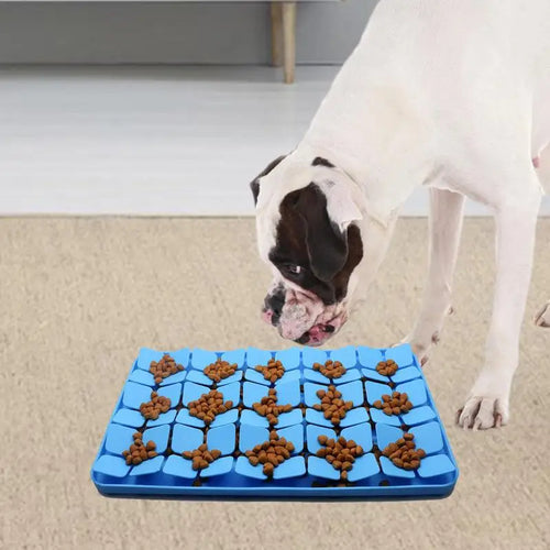 Dog licking treats from the lick mat