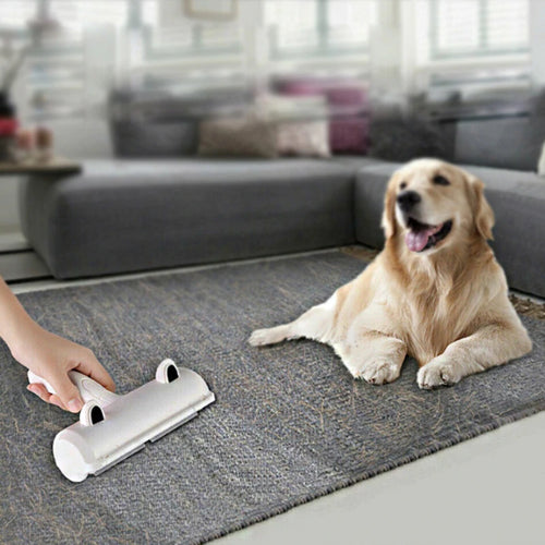 FurAway pet hair remover roller on a rug next to a dog